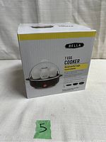 Boxed Bella 7 Egg Cooker showing product and brand name with image of cooker.