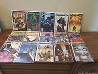 Full set of 20 DC Futures End comics laid out on a dresser, showing front covers with vibrant comic art from the New 52 series.