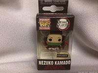 Front view of Funko Pocket Pop! keychain box showing Nezuko Kamado character and branding.