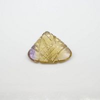 Top and angled views of the leaf-shaped ametrine gemstone showing carved crisscross pattern and color variation in yellow and purple.