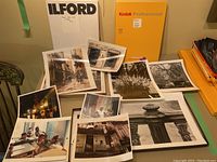 Photos of professional photographic prints from Cuba 1999 by Kelsey Mason, showing various scenes in color and black & white on Kodak and Ilford photographic paper.