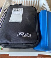 Black zippered Wahl branded case for clippers and accessories