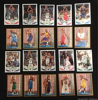 Front of 20 basketball cards arranged in 4 rows, showing players and card designs.