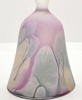 Front side view of the art glass bell showing purple, gray, and beige abstract color design.