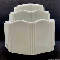 Front view of the vintage white Art Deco style ceiling light shade with stepped geometric design and vertical linear detailing.
