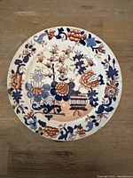 Full view of the antique Mason's plate with floral decoration.