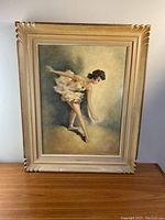 Frontal view of the framed oil painting showing the ballet dancer in a tutu against a softly shaded background.