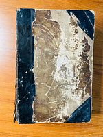 Front cover of Chambers Journal Volume 9, showing worn cover with black leather corners and spine, heavily distressed with visible wear and damage.