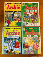 Four Archie comics in French from Editions Heritages with colorful covers, including issues #90, #199, #206, #211 visible on covers. Comics measure about 7 1/4" x 10 1/2". Excellent condition seen.