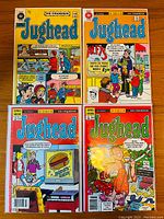 Four Jughead comic books arranged in a 2x2 grid showing front covers with colorful and vibrant comic art, text in French, issues #56, #113, #147, and #155 by Editions Heritages.
