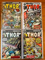 Four French Canadian Thor comics arranged in a rectangle, showing covers of issues #33, #41, #53, and #55. Colorful action-packed illustrations visible.