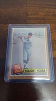 Front side of 1962 Topps Babe Ruth Twilight Years baseball card showing Babe Ruth posed with bat, card encased in protective plastic sleeve.