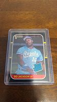 Front of 1986 Donruss Bo Jackson baseball card showing Bo Jackson in Kansas City Royals jersey with Rated Rookie logo and Donruss branding.