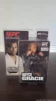 Front view of packaged UFC Royce Gracie action figure showing figure and front card graphics