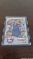 Front view of the Tom Brady Montreal Expos baseball card showing the player in catcher's gear.