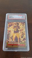 Front of the card showing Tom Brady in slab