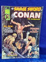 Front cover of the comic showing Conan the Barbarian fighting skeletal enemies with title and story names