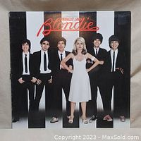 Front cover of Blondie Parallel Lines album showing band members and title.