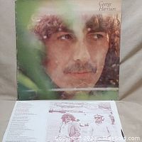 Front cover of George Harrison self-titled vinyl LP album, showing George Harrison's face.