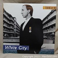 Front cover of 'White City: A Novel' album by Pete Townshend featuring black and white profile image of artist with urban buildings.
