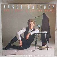 Front cover of vinyl LP album by Roger Daltrey titled 'Can't Wait To See The Movie' showing portrait of artist and album title.