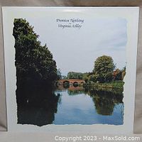 Front cover of 'Promise Nothing' album by Virginia Astley showing river and bridge scenery.