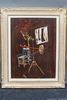 Front view of framed acrylic painting on board with chair and stand motif against brown background