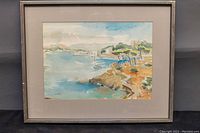 Full view of the framed watercolour painting showing the coastal landscape scene and entire frame.