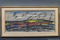 Full view of the framed watercolor painting showing abstract landscape.