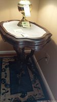 Top view of marble surface and table apron under lamp