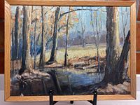 Full view of original oil painting showing spring forest with budding trees and meadow, framed in wood.
