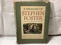 Front cover of the dust jacket for the book titled "A Treasury of Stephen Foster" showing wear, chipping, and discoloration with an illustrated scene below the title.