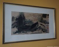 Framed abstract painting hung on yellow wall showing full piece including frame and matting