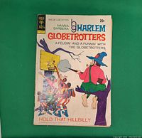 Front cover of the Harlem Globetrotters comic book titled "Hold That Hillbilly", showing colorful cartoon characters and the 20 cent price in the top right corner.