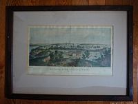 Framed colored lithograph showing wide view of Ottawa City Lower Town from 1855 with title and details below image.