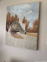 Painting of barn with people and chickens set among autumn-colored trees under partly cloudy sky