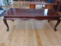 Front view showing full table top and cabriole legs