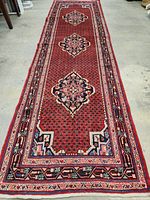 Full-length shot of runner on floor showing entire three-medallion layout