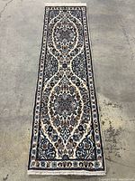 Full view of the runner carpet laid flat on concrete floor