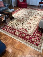 Wide shot showing full floral rug in living room setting