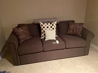Front view of brown La-Z-Boy sofa bed with cushions