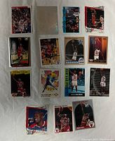 Front side of all 15 Michael Jordan basketball cards laid out in three rows showing various action shots and Catch-22 branding.