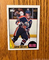 Front view of 1987-88 Topps Wayne Gretzky hockey card showing him in Edmonton Oilers uniform.