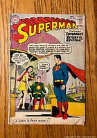 Front cover of Superman comic book issue 141 showing main characters and title text about Superman's return to Krypton.