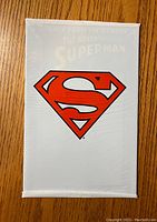 Front of Superman #500 comic sealed in protective bag showing red Superman logo on white cover.