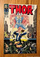 Front cover of The Mighty Thor comic issue 138 dated March 1967 showing Thor saving a man from attackers in a city.