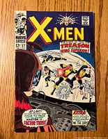 Front cover of the X-Men #37 comic book showing main characters and title with action scene and text about the story.