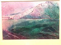 Photo showing full view of large framed watercolor and acrylic painting with colors of pink, purple, green and blue depicting abstract mountain and water scene.