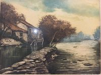 Framed vintage engraving showing old houses by the river with a stone path and a deer, pencil signed.