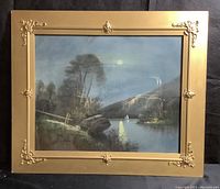 Frontal view of the vintage pastel style print showing a moonlit shore and detailed gold-toned frame with decorative corners.